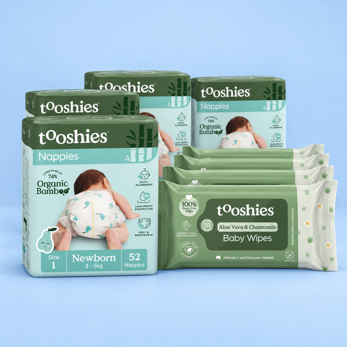 Tooshies Size 1 newborn nappy and baby wipes bundle with four 52-pack nappies and four 70-pack Aloe Vera and Chamomile wipes on a blue background